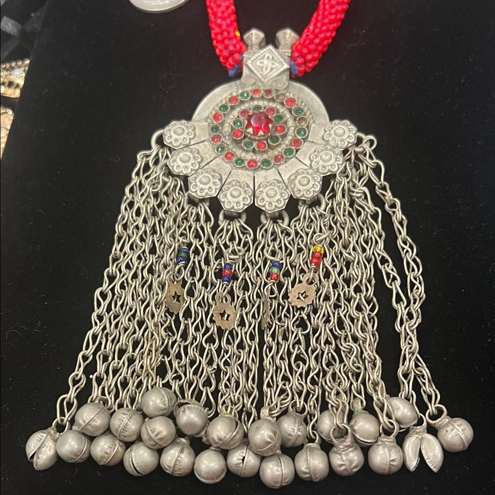 Elegant Silver and Red Necklace with Intricate Design